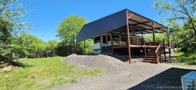 140 Last Resort Rd, Stigler, OK 74462 - view of property exterior with stairs and a deck