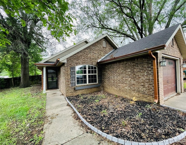 605 N Maple, Sallisaw, OK 74955 - single story home featuring an attached garage and brick siding