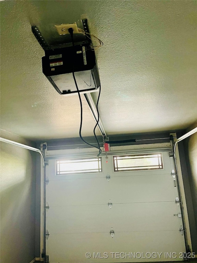 605 N Maple, Sallisaw, OK 74955 - garage featuring a garage door opener