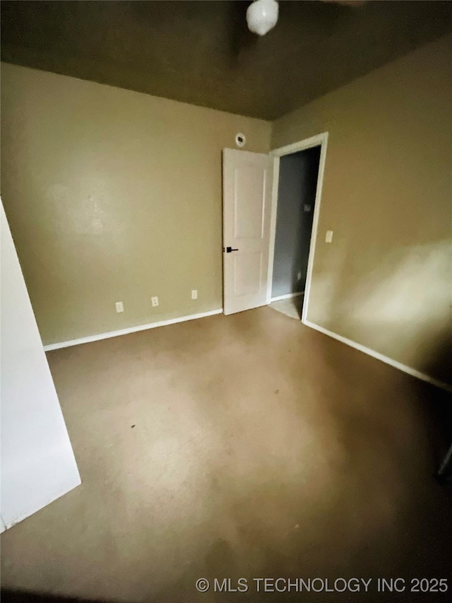 605 N Maple, Sallisaw, OK 74955 - carpeted spare room with baseboards
