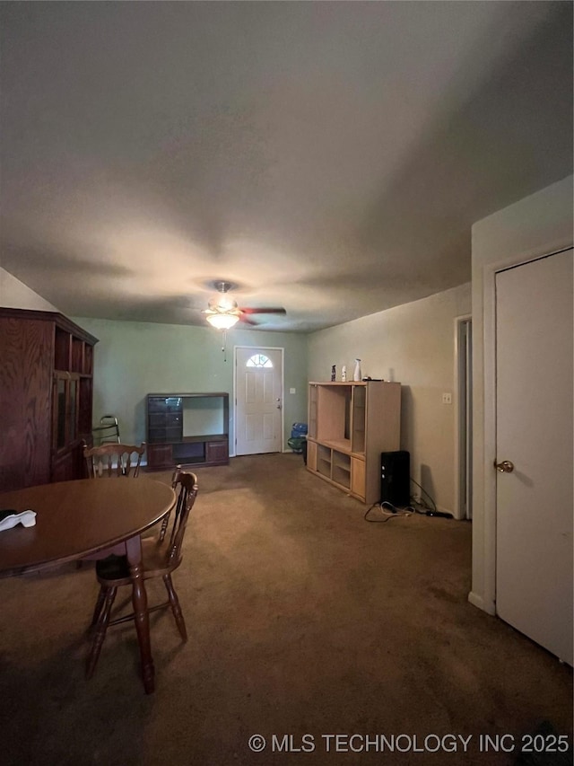 1003 E 4th St, Cushing, OK 74023 - living room with ceiling fan and carpet flooring