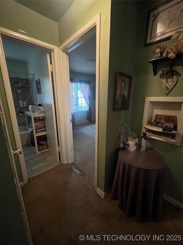 1003 E 4th St, Cushing, OK 74023 - hallway featuring carpet