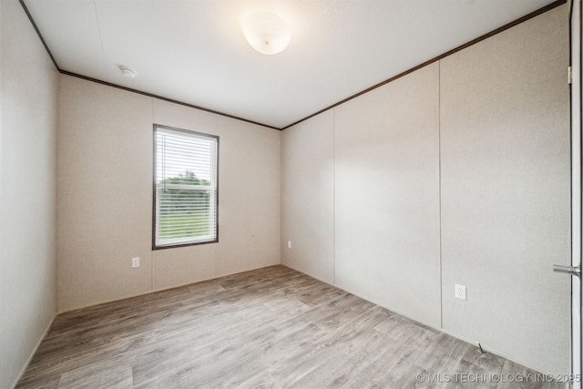 348939 E 750th Rd, Cushing, OK 74023 - unfurnished room with wood finished floors and crown molding