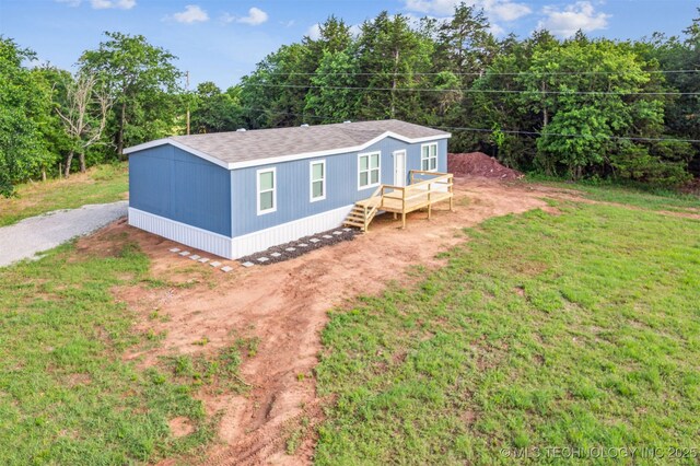 348939 E 750th Rd, Cushing, OK 74023 - view of front of home featuring a front yard and roof with shingles
