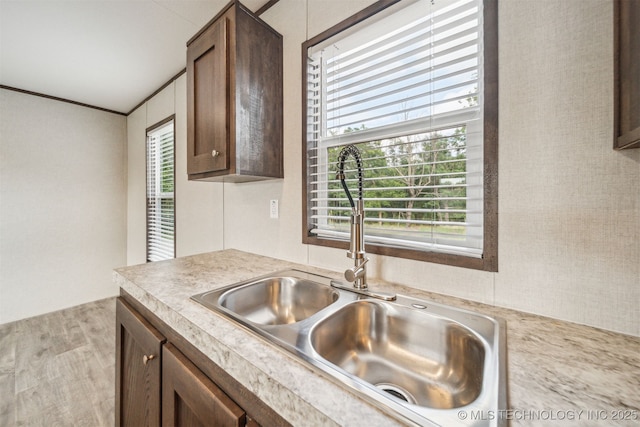 348939 E 750th Rd, Cushing, OK 74023 - kitchen with a sink, light countertops, healthy amount of natural light, and wood finished floors