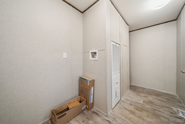 348939 E 750th Rd, Cushing, OK 74023 - laundry area with light wood-style floors and hookup for a washing machine