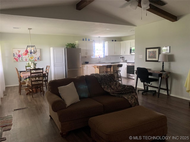 11175 S Oologah Blvd, Oologah, OK 74053 - living area with ceiling fan, dark wood finished floors, and baseboards