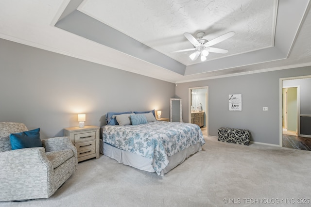 1209 Sherwood Ln, Broken Arrow, OK 74011 - bedroom featuring a raised ceiling, light carpet, ornamental molding, baseboards, and a ceiling fan