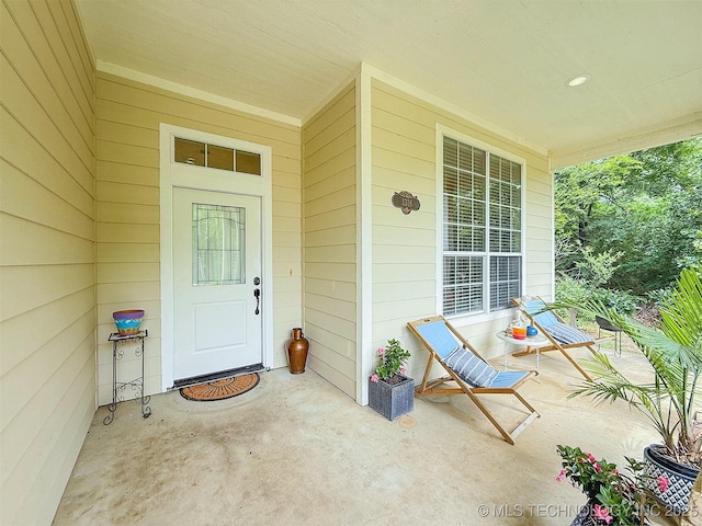1318 Emily Ln, Ada, OK 74820 - property entrance with a porch