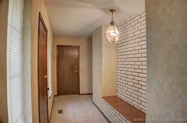4004 S Hickory Ave, Broken Arrow, OK 74011 - corridor featuring light flooring and a textured ceiling