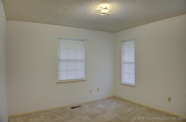 4004 S Hickory Ave, Broken Arrow, OK 74011 - empty room with carpet flooring, a textured ceiling, and baseboards