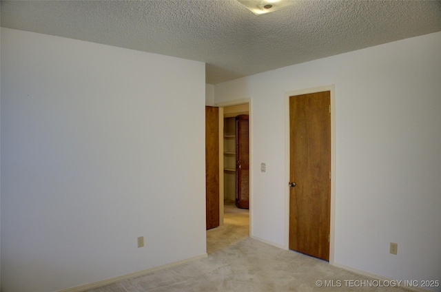 4004 S Hickory Ave, Broken Arrow, OK 74011 - empty room featuring light colored carpet and a textured ceiling