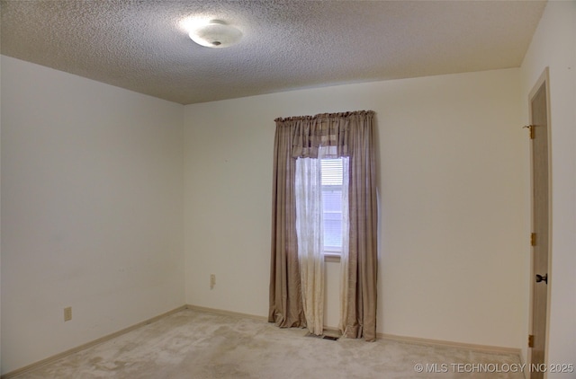 4004 S Hickory Ave, Broken Arrow, OK 74011 - carpeted spare room with a textured ceiling and baseboards
