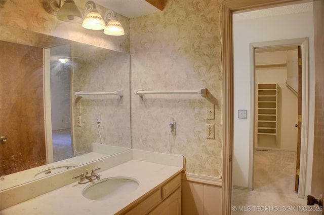 4004 S Hickory Ave, Broken Arrow, OK 74011 - bathroom with wallpapered walls and vanity