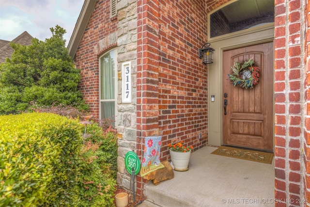 3117 S Hemlock Ct, Broken Arrow, OK 74012 - doorway to property with brick siding