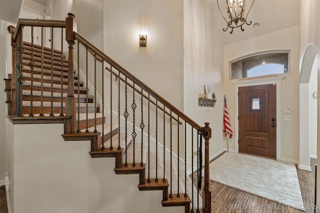3117 S Hemlock Ct, Broken Arrow, OK 74012 - entryway featuring wood finished floors, a chandelier, stairs, and baseboards