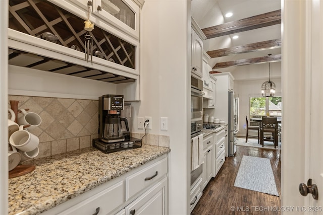 3117 S Hemlock Ct, Broken Arrow, OK 74012 - kitchen with freestanding refrigerator, backsplash, dark wood-type flooring, white cabinets, and light stone counters