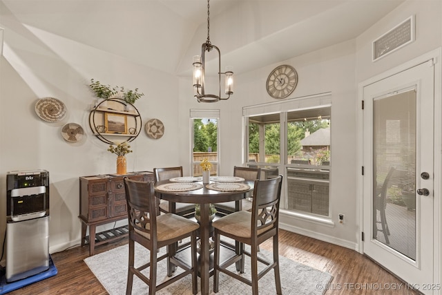 3117 S Hemlock Ct, Broken Arrow, OK 74012 - dining space with lofted ceiling, dark wood-style floors, and baseboards