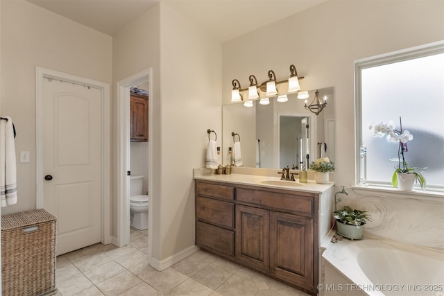 3117 S Hemlock Ct, Broken Arrow, OK 74012 - full bathroom with vanity, a bath, tile patterned flooring, and toilet