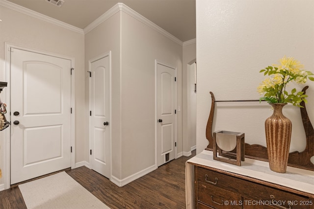 3117 S Hemlock Ct, Broken Arrow, OK 74012 - entrance foyer featuring dark wood-style flooring, crown molding, and baseboards