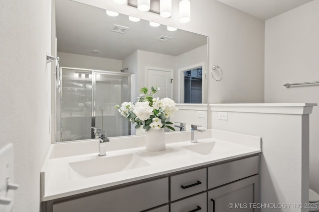 12503 N 130th Ave E, Collinsville, OK 74021 - bathroom with double vanity and a shower stall