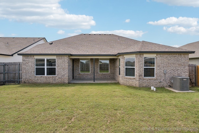12503 N 130th Ave E, Collinsville, OK 74021 - back of house featuring cooling unit, a patio area, brick siding, and roof with shingles