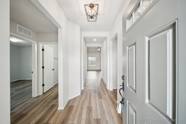 12503 N 130th Ave E, Collinsville, OK 74021 - foyer entrance with light wood-style floors, baseboards, and ceiling fan