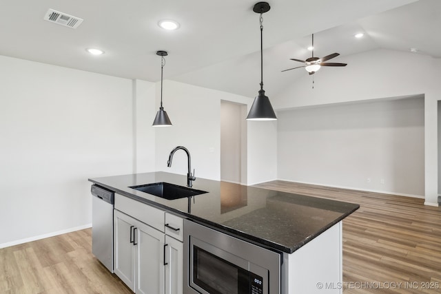 12503 N 130th Ave E, Collinsville, OK 74021 - kitchen with a sink, appliances with stainless steel finishes, a ceiling fan, light wood-style floors, and recessed lighting
