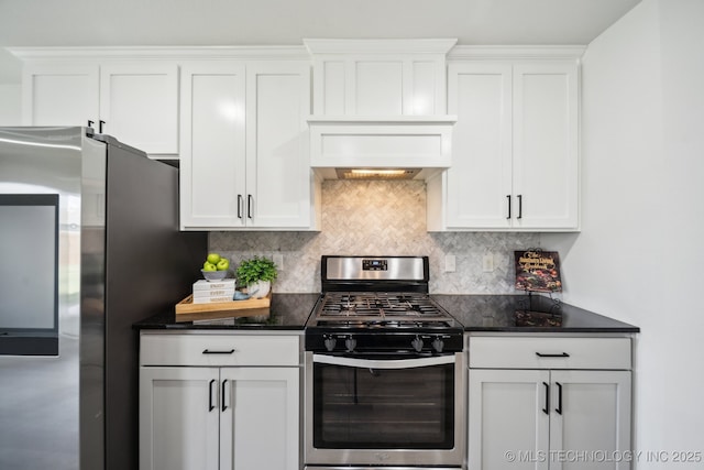 12503 N 130th Ave E, Collinsville, OK 74021 - kitchen featuring appliances with stainless steel finishes, decorative backsplash, and white cabinets