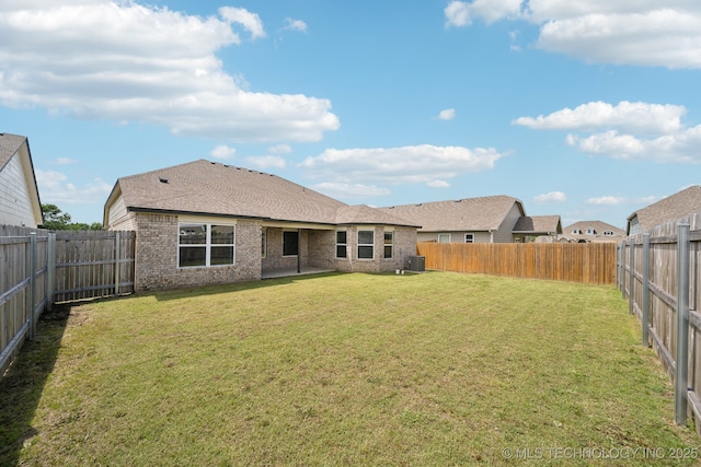 12503 N 130th Ave E, Collinsville, OK 74021 - rear view of house with central air condition unit and brick siding