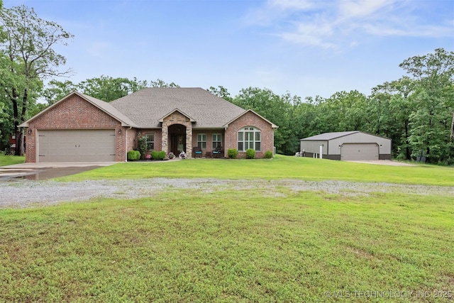 23532 N 5 Mile Rd, Fort Gibson, OK 74434 - view of front of home featuring brick siding, a front lawn, and a shingled roof