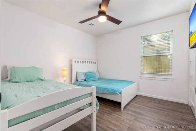 14 Missouri Dr, Afton, OK 74331 - bedroom with wood finished floors, ceiling fan, and baseboards