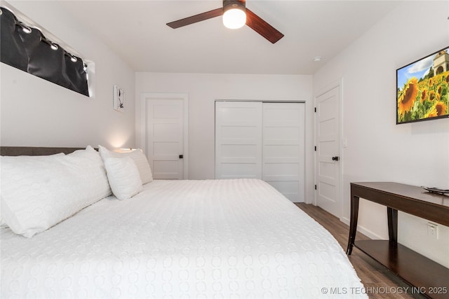 14 Missouri Dr, Afton, OK 74331 - bedroom featuring wood finished floors, a closet, and a ceiling fan