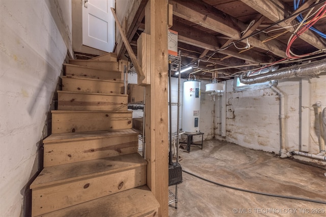 2305 E 13th St, Tulsa, OK 74104 - stairs featuring electric water heater and unfinished concrete flooring