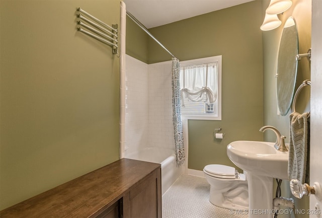 2305 E 13th St, Tulsa, OK 74104 - full bath featuring toilet, shower / tub combo, tile patterned flooring, and baseboards