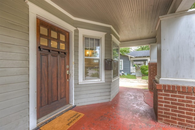 2305 E 13th St, Tulsa, OK 74104 - property entrance featuring covered porch