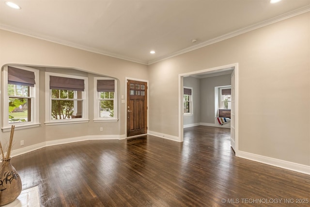 2305 E 13th St, Tulsa, OK 74104 - entrance foyer with crown molding, baseboards, wood finished floors, and recessed lighting