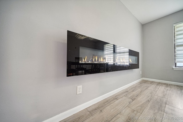 6407 S 110th E Ave, Tulsa, OK 74133 - detailed view of wood finished floors and baseboards