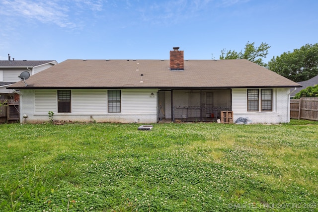 6407 S 110th E Ave, Tulsa, OK 74133 - rear view of property with a chimney, brick siding, and roof with shingles