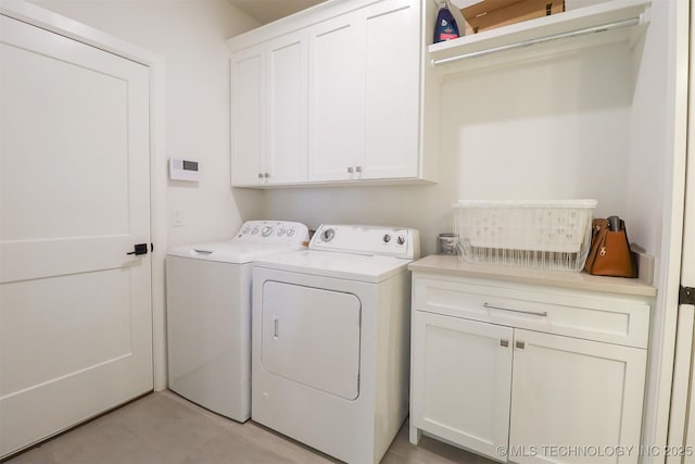 13657 S 21st Ct E, Bixby, OK 74008 - laundry room featuring cabinet space, washer and clothes dryer, and light tile patterned floors