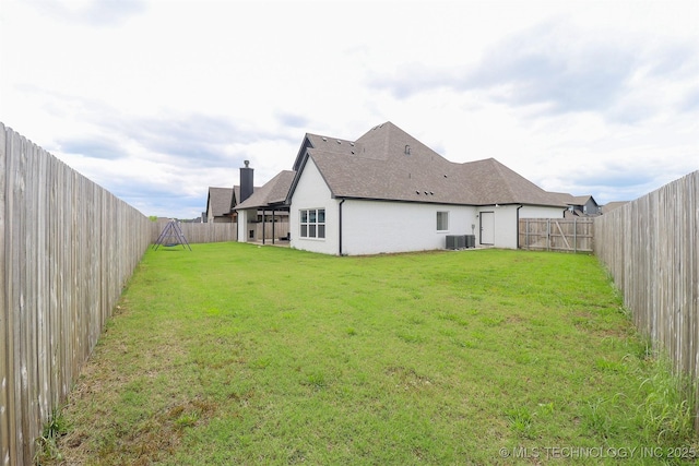13657 S 21st Ct E, Bixby, OK 74008 - back of property with a chimney, central air condition unit, and roof with shingles