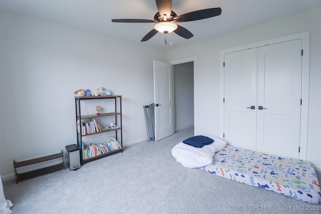 13657 S 21st Ct E, Bixby, OK 74008 - bedroom with carpet floors, a closet, ceiling fan, and baseboards