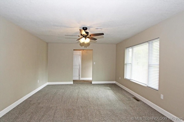 2005 Holly Rd, Claremore, OK 74017 - empty room with ceiling fan, carpet floors, and baseboards