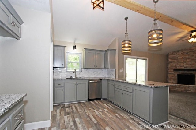 2005 Holly Rd, Claremore, OK 74017 - kitchen featuring gray cabinetry, dishwasher, and a sink