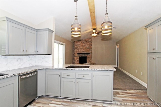 2005 Holly Rd, Claremore, OK 74017 - kitchen featuring stainless steel dishwasher, a peninsula, a ceiling fan, light wood-style floors, and backsplash