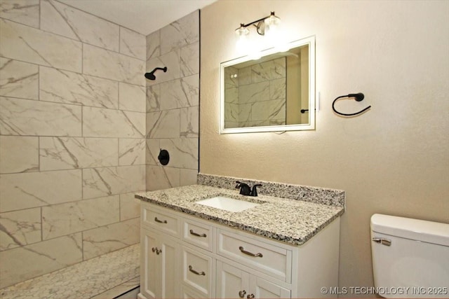 2005 Holly Rd, Claremore, OK 74017 - full bath featuring vanity, a tile shower, and toilet
