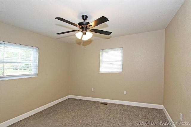 2005 Holly Rd, Claremore, OK 74017 - spare room with carpet floors, ceiling fan, and baseboards
