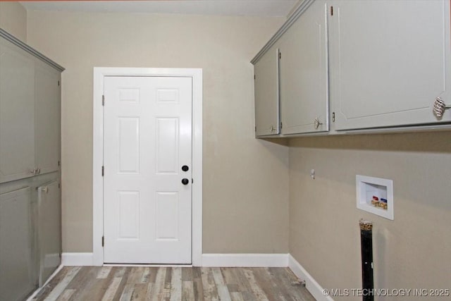 2005 Holly Rd, Claremore, OK 74017 - laundry area with cabinet space, light wood-type flooring, washer hookup, and baseboards