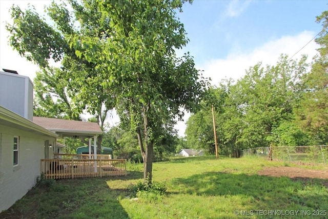 2005 Holly Rd, Claremore, OK 74017 - view of yard featuring a deck