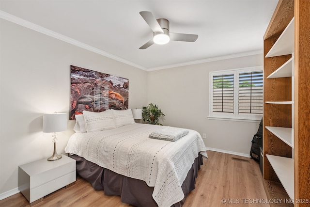 5206 S Harvard Ave Unit 308, Tulsa, OK 74135 - bedroom featuring wood finished floors, crown molding, baseboards, and a ceiling fan